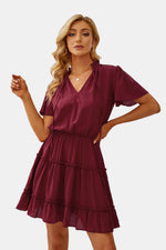 Load image into Gallery viewer, Tie Neck Ruffle Hem Tiered Dress
